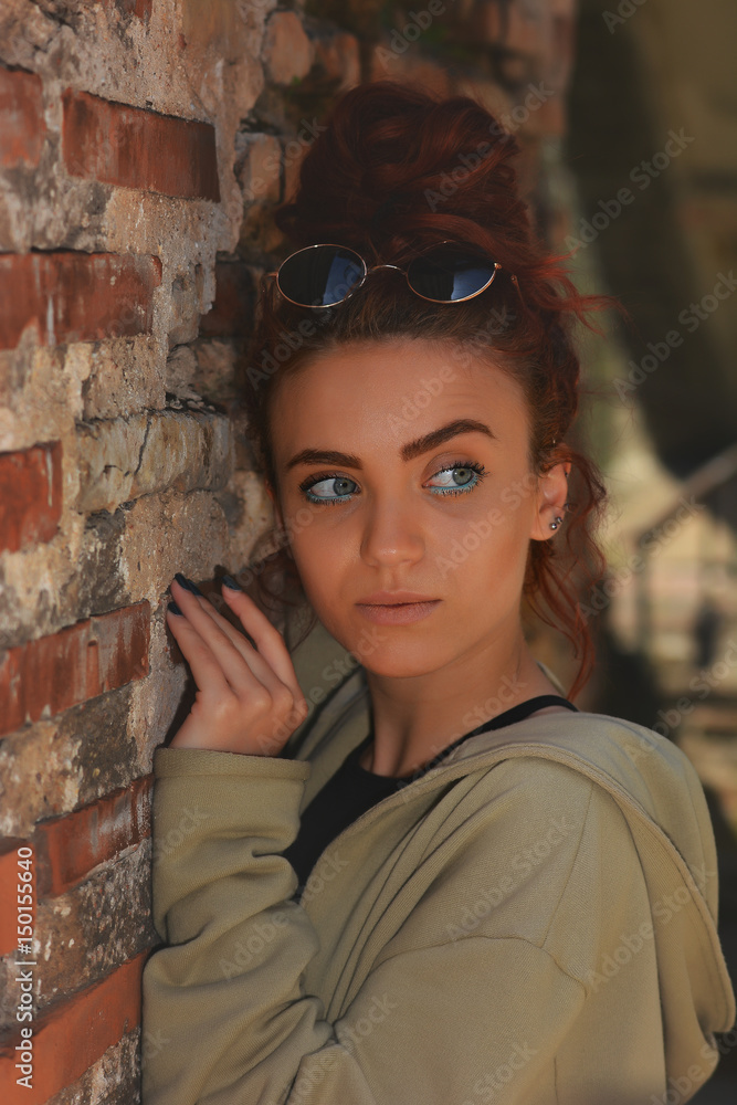 Portrait of a beautiful redhead with blue eyes Portrait of a beautiful redhead with blue eyes