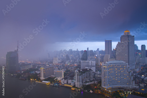 Raining storm over Bangkok skyline.