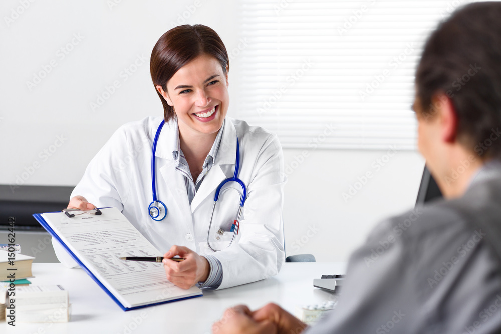 Doctor requesting the signature of a patient Doctor requesting the signature of a patient