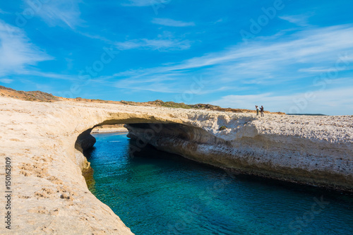 Limestone rock with arch, S`Archittu di Santa Caterina in Oristano Province, Sardinia, Italy