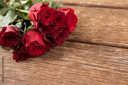 Bunch of red roses and gift box