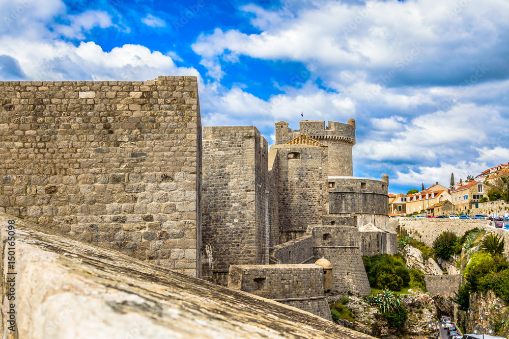 City Walls Dubrovnik. / View at fortified city walls in old town Dubrovnik, famous touristic attraction in Europe, UNESCO World's Heritage Site.