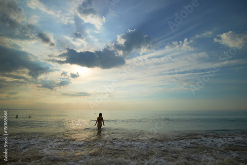 Girl emerges from the sea
