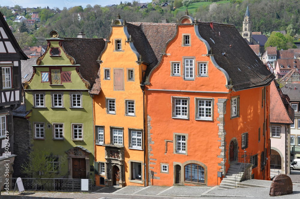 Three beautiful colorful old building on the market square of Schwabisch Hall, Baden-Wurttemberg, Germany.