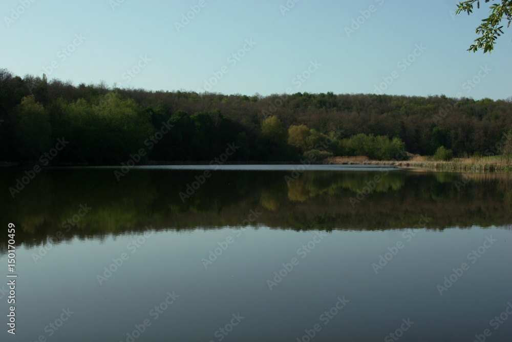 Mirror lake in the mountains