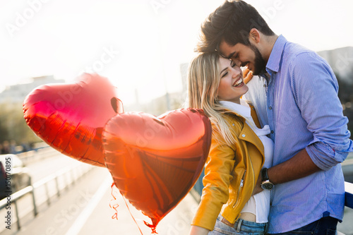 Couple in love kissing laughing and having fun