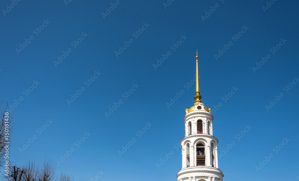 High white bell tower in Shuya, Ivanovo region, Russia.