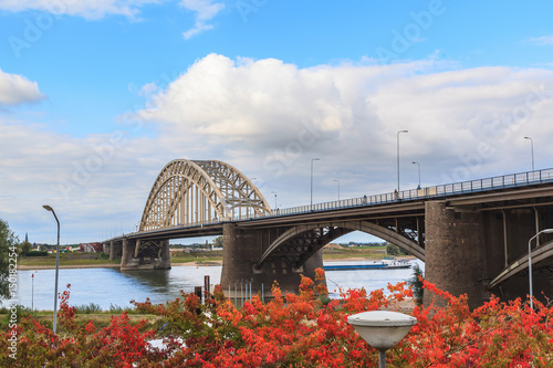 Beautiful construction of Waal bridge over river, Nijmegen Netherlands © Akarapong Suppasarn