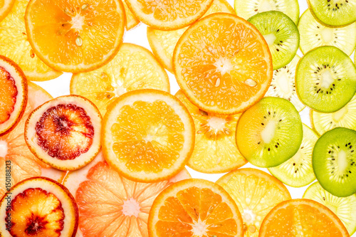 Mixed transparent citrus fruit on white