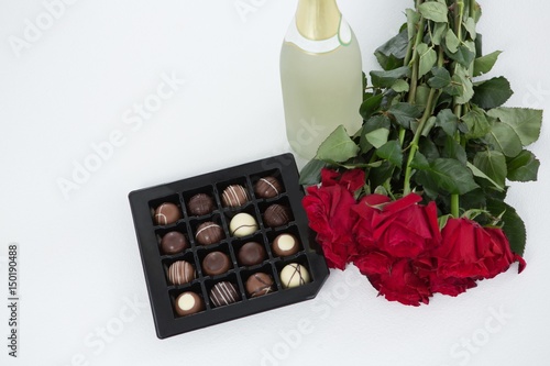 Gift, chocolate box, roses and champagne bottle