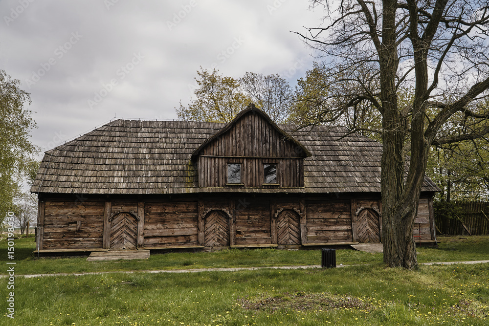 Obraz premium Rural, traditional wooden house in Poland.