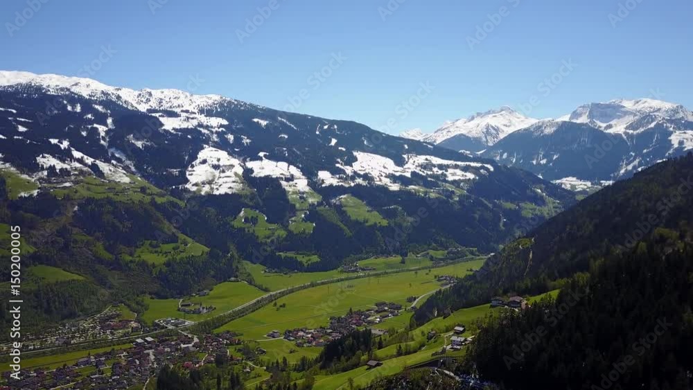 Aerial view of flying over a valley in the Austrian Alps Aerial view of flying over a valley in the Austrian Alps