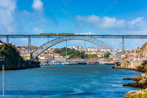 Subway Train crossing the Dom Luis I Bridge in Porto Portugal © allard1