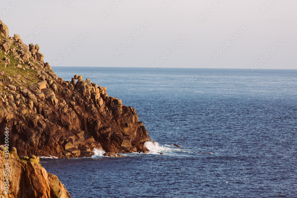 Ocean view with rocks at coast Cornwall