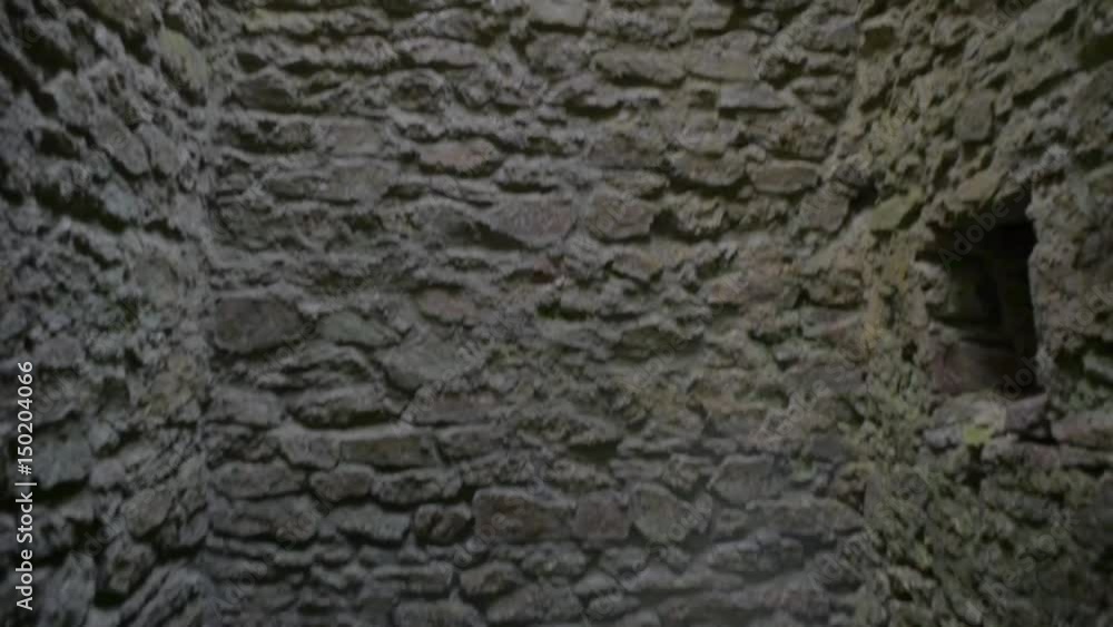 Gothic castle tower dungeon cell with stone walls, empty Gothic castle tower dungeon cell with stone walls, empty
