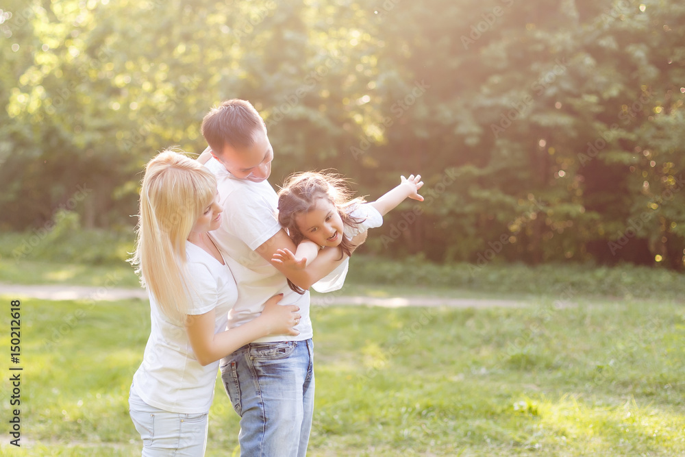 Fototapeta premium happy family having fun outdoors