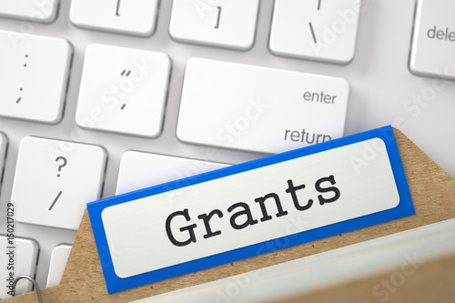 Grants Concept. Word on Orange Folder Register of Card Index. Closeup View. Blurred Illustration. 3D Rendering.