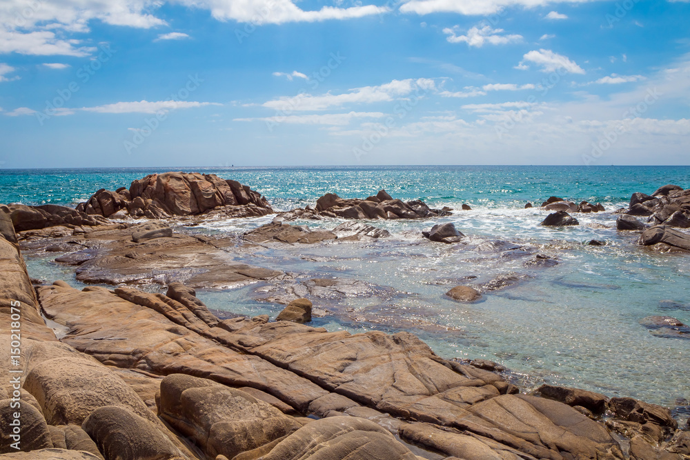 Rocks in crystal clear sea water of Villasimius beach, Sardinia island, Italy Rocks in crystal clear sea water of Villasimius beach, Sardinia island, Italy