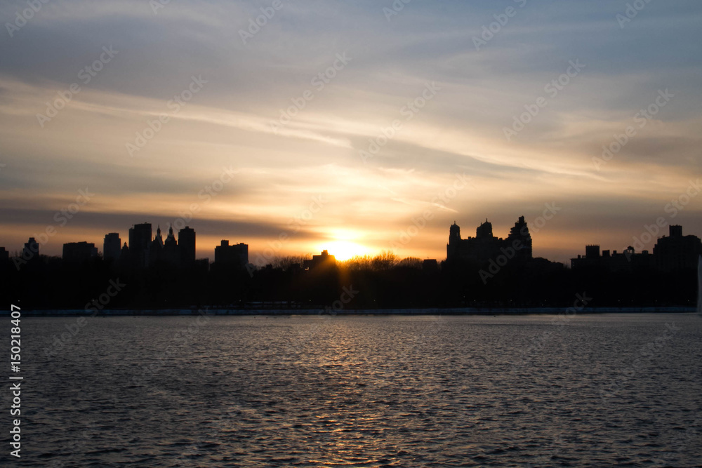 Sunset reflects on the lake in New York