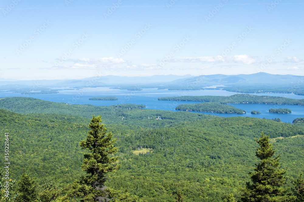 Fototapeta premium Idyllic view of Lake Winnipesaukee, Mount Major in Maine, USA