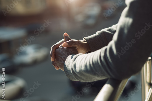 Cropped shot of african american male hands in city