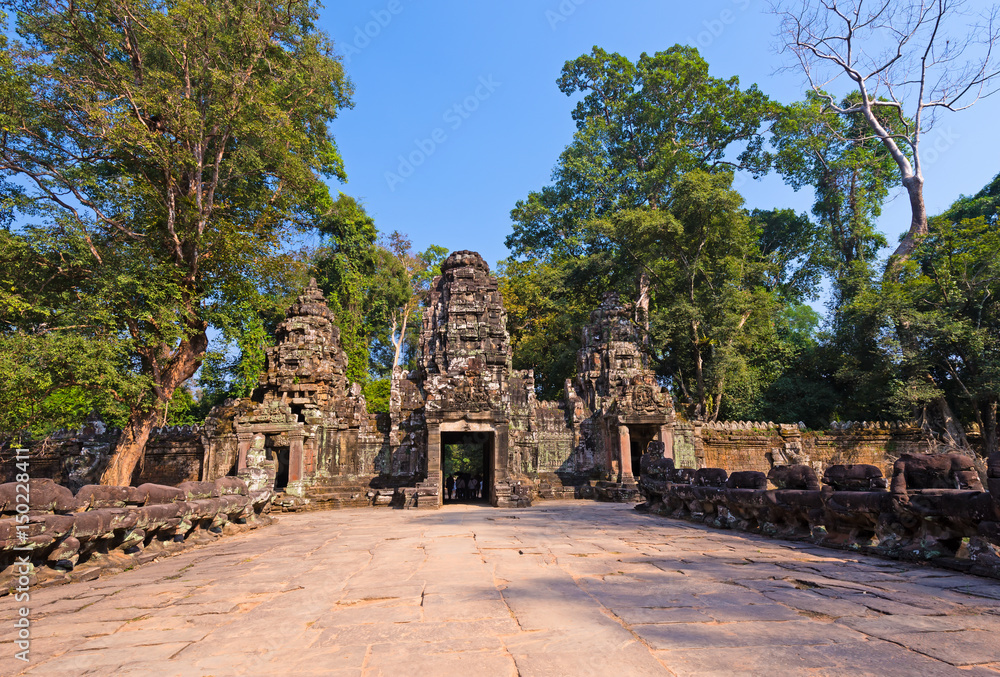Angkor Thom entrance gate with Buddha statue in Siem Reap, Cambodia
