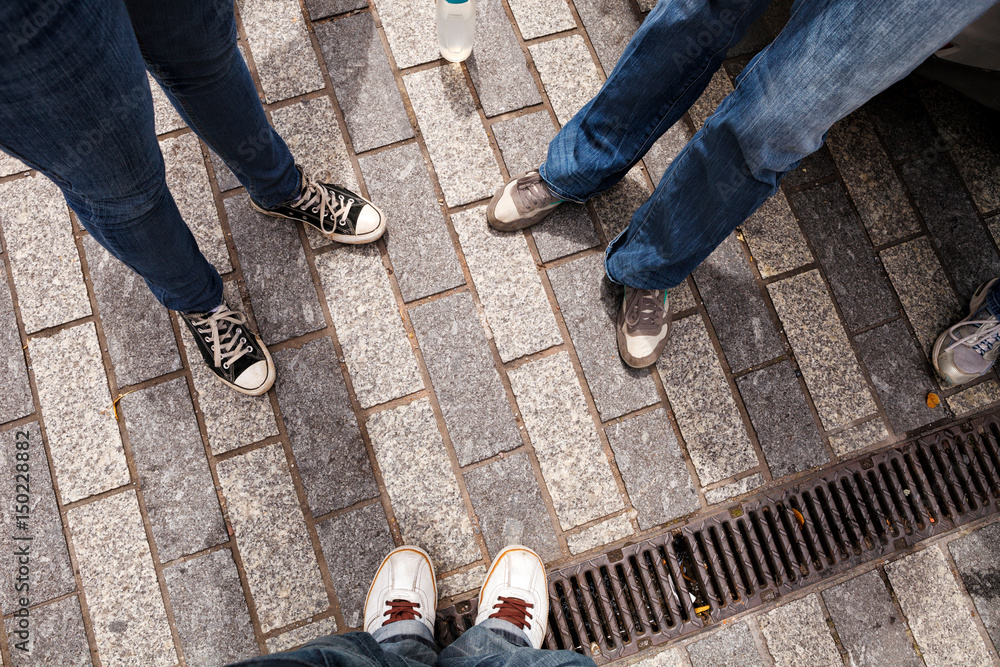 Youth Showing Jeans and Sneakers Youth Showing Jeans and Sneakers