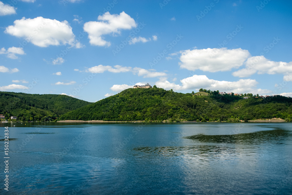 Castle on top of hill at Edersee Germany sea water sky forrest