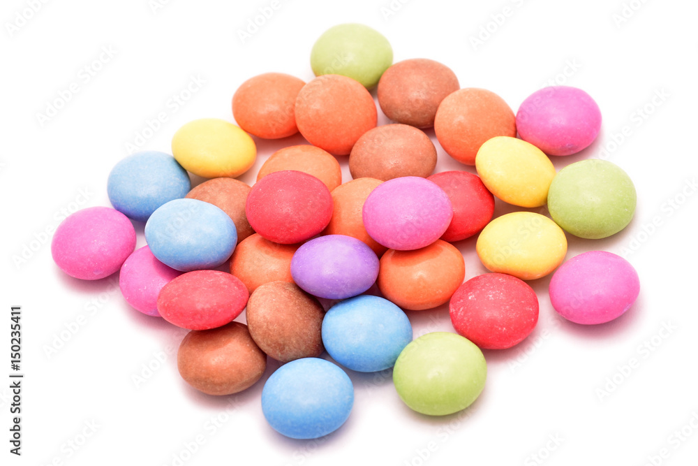 Colorful chocolate glazed candies isolated on white Colorful chocolate glazed candies isolated on white