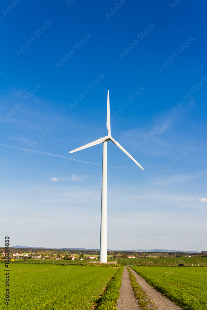 Wind turbine with blue sky - renewable energy Wind turbine with blue sky - renewable energy