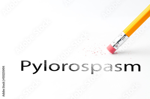 Closeup of pencil eraser and black pylorospasm text. Pylorospasm. Pencil with eraser. photo