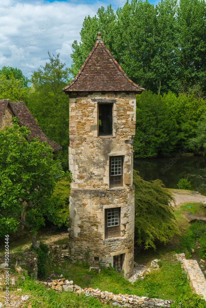 Carennac, Lot, France, May 5, 2017: View of silent street in the small French town Carennac, Lot, France, May 5, 2017: View of silent street in the small French town