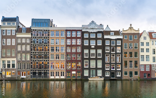 Amsterdam, The Netherlands, May 4th 2017:  Row of authentic canal houses on the Rokin in Amsterdam