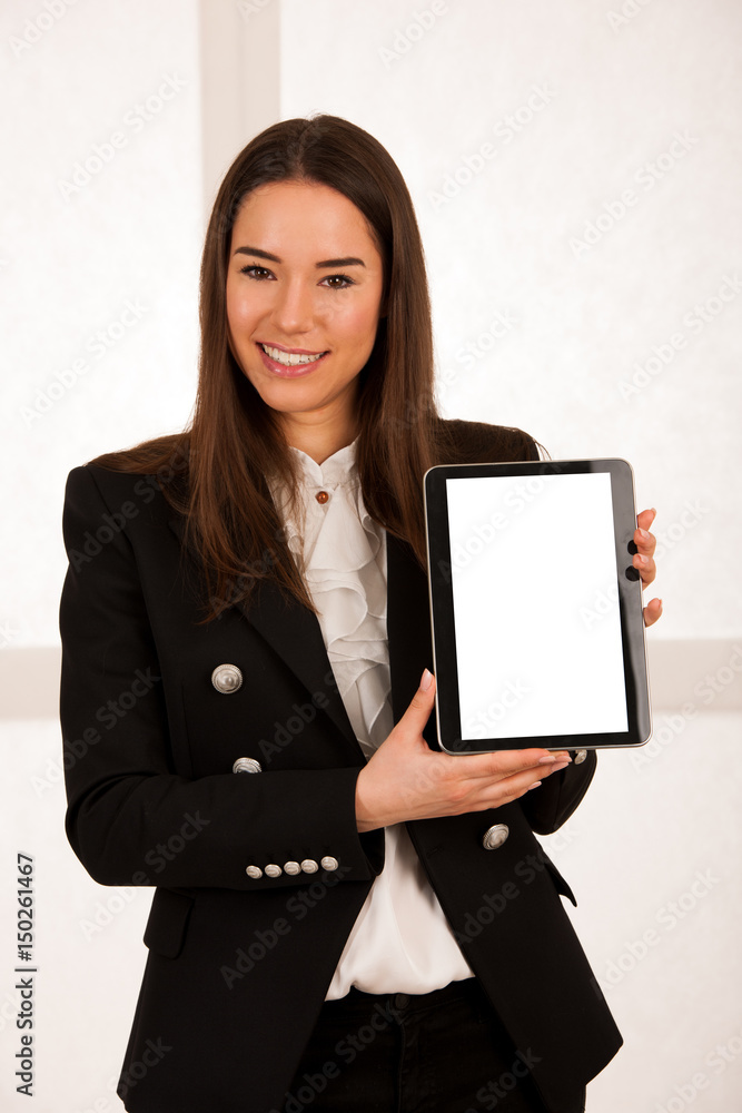 asian caucasian business woman browsing web on tablet computer asian caucasian business woman browsing web on tablet computer