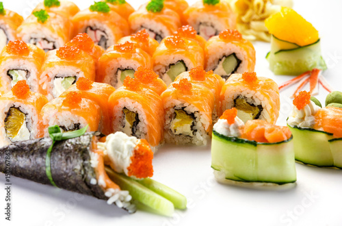 Sushi rolls over white background