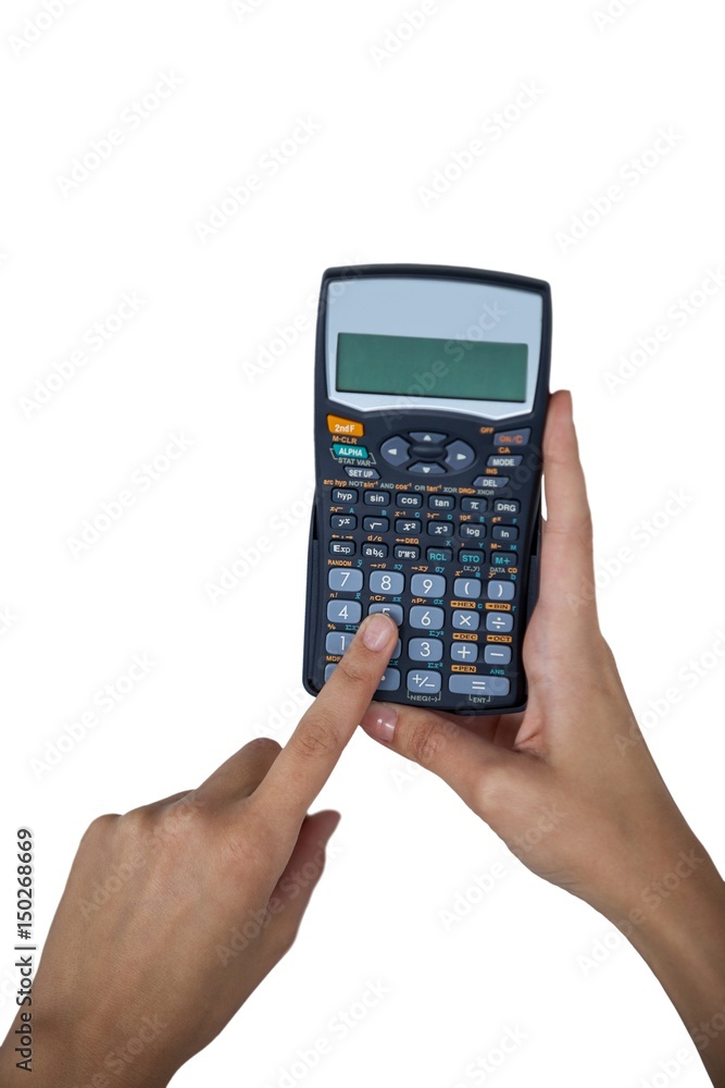 Hand of businesswoman using calculator Hand of businesswoman using calculator