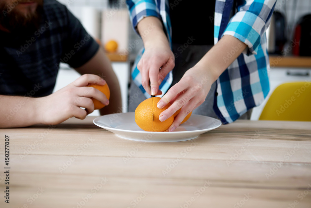 Cutting oranges, fruits