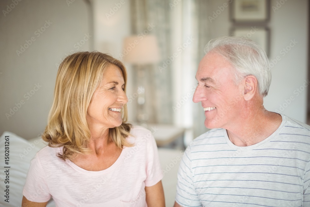 Happy senior couple looking at each other Happy senior couple looking at each other