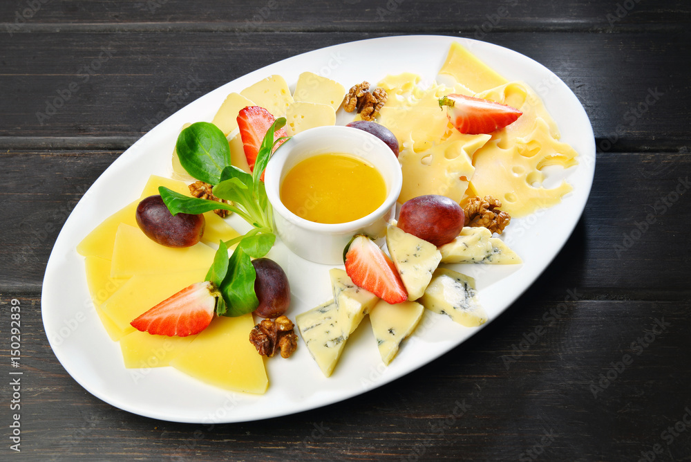 Assorted cheese on a plate Assorted cheese on a plate
