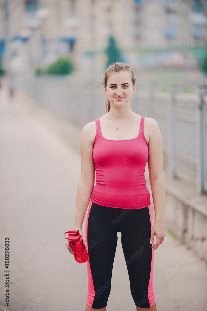 sport girl it the gym and on the jog