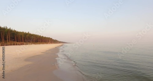 Wallpaper Mural Sunrise of sun setting over Baltic sea on calm morning. Aerial shoot. Lubiatowo, Poland. Torontodigital.ca