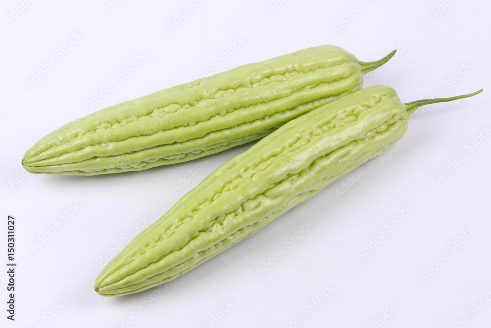 Bolt of Chinese bitter gourd on wood. Bolt of Chinese bitter gourd on wood.