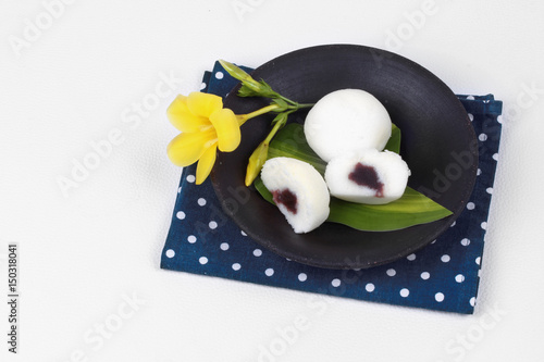 Japanese dessert ,Steamed rice flour cake fillin sweet red bean. photo