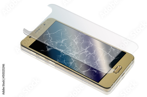 Złoty smartfon z rozbitym ekranem i zapasowa szybka