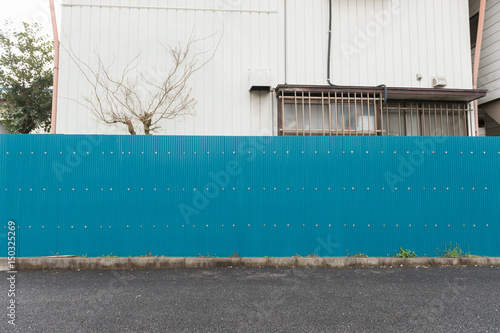 street wall background ,Industrial background, empty grunge urban street with warehouse brick wall photo