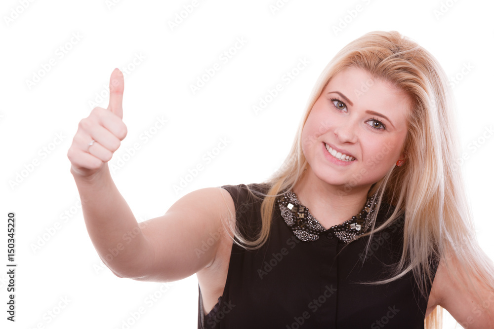 Smiling blonde woman making thumb up gesture Smiling blonde woman making thumb up gesture