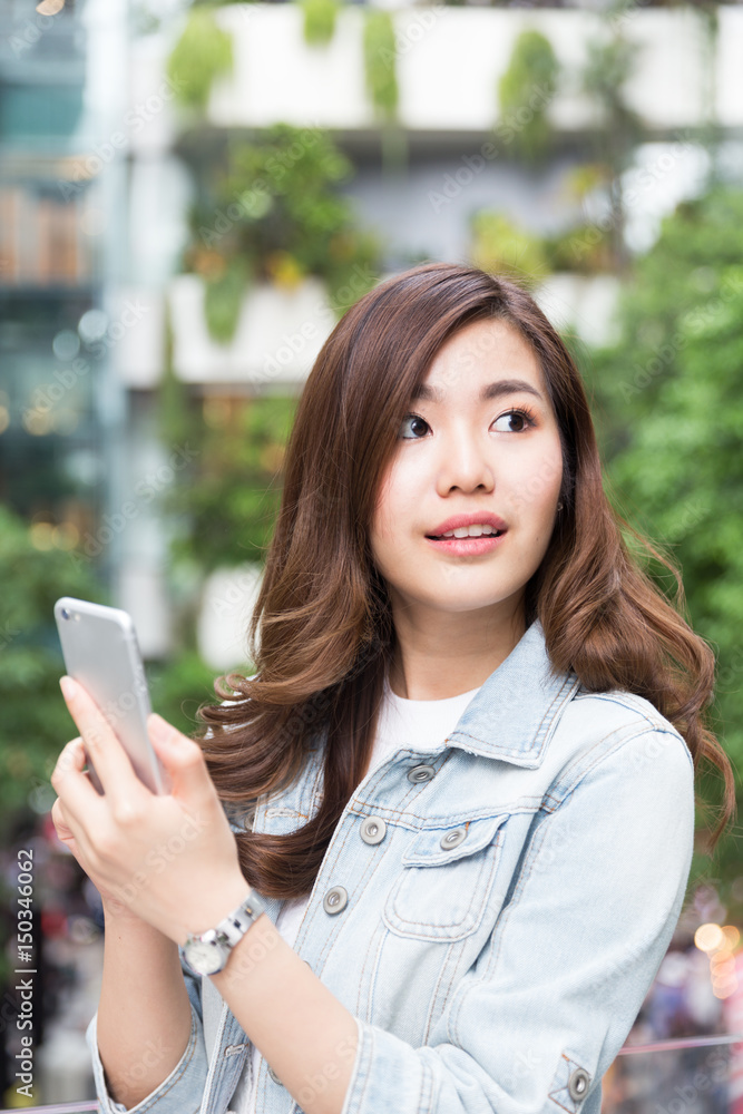 Young asian lady traveling in city center Young asian lady traveling in city center