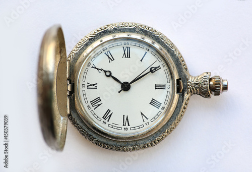 Close up pocket watch on white background.