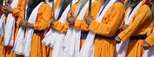 many men sikh with traditional clothes photo