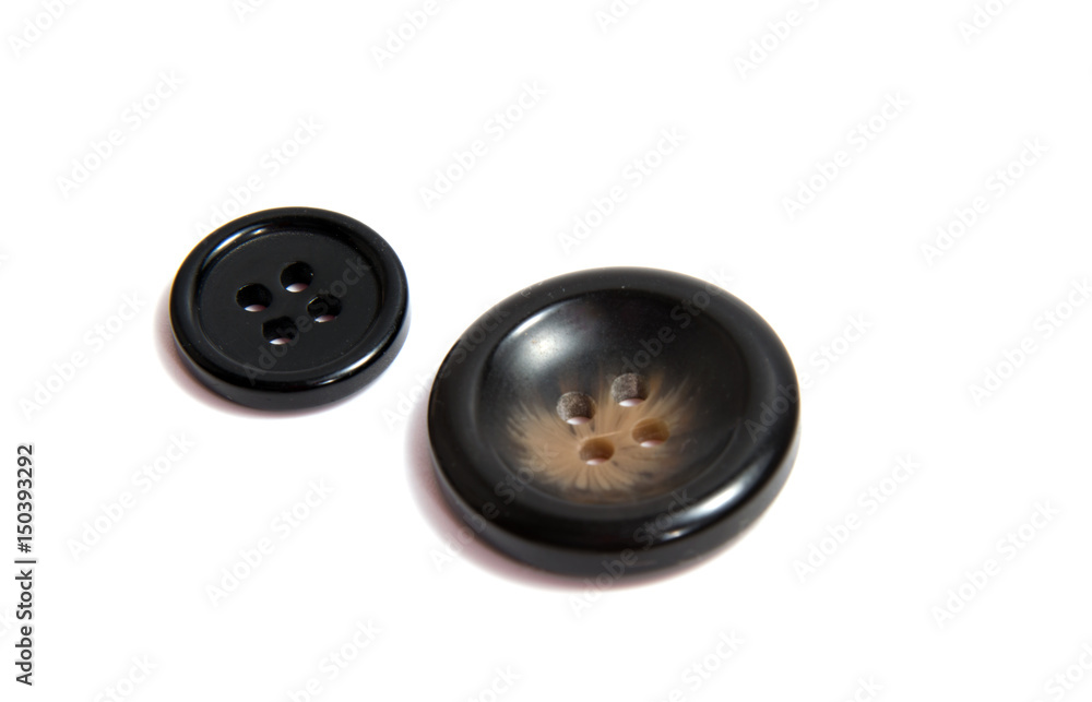 Single brown clothing button isolated over the white background Single brown clothing button isolated over the white background